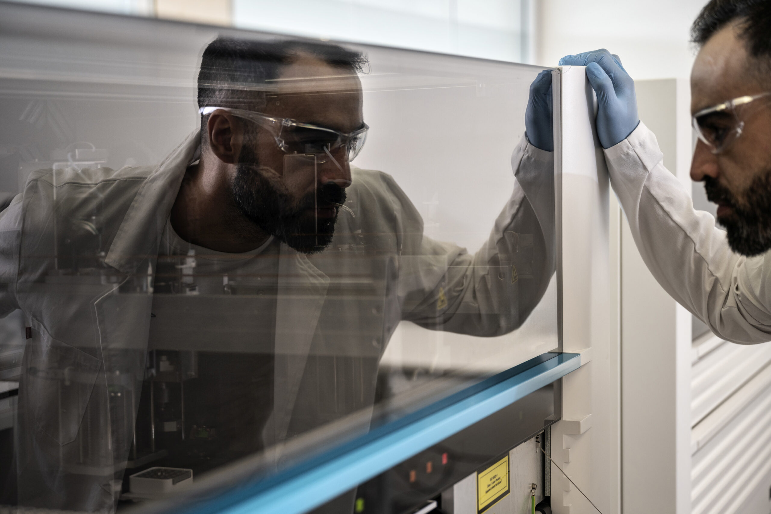 professionals using digital technology in a hospital setting, symbolising the integration of digital tools to meet rising patient demand and improve care quality.