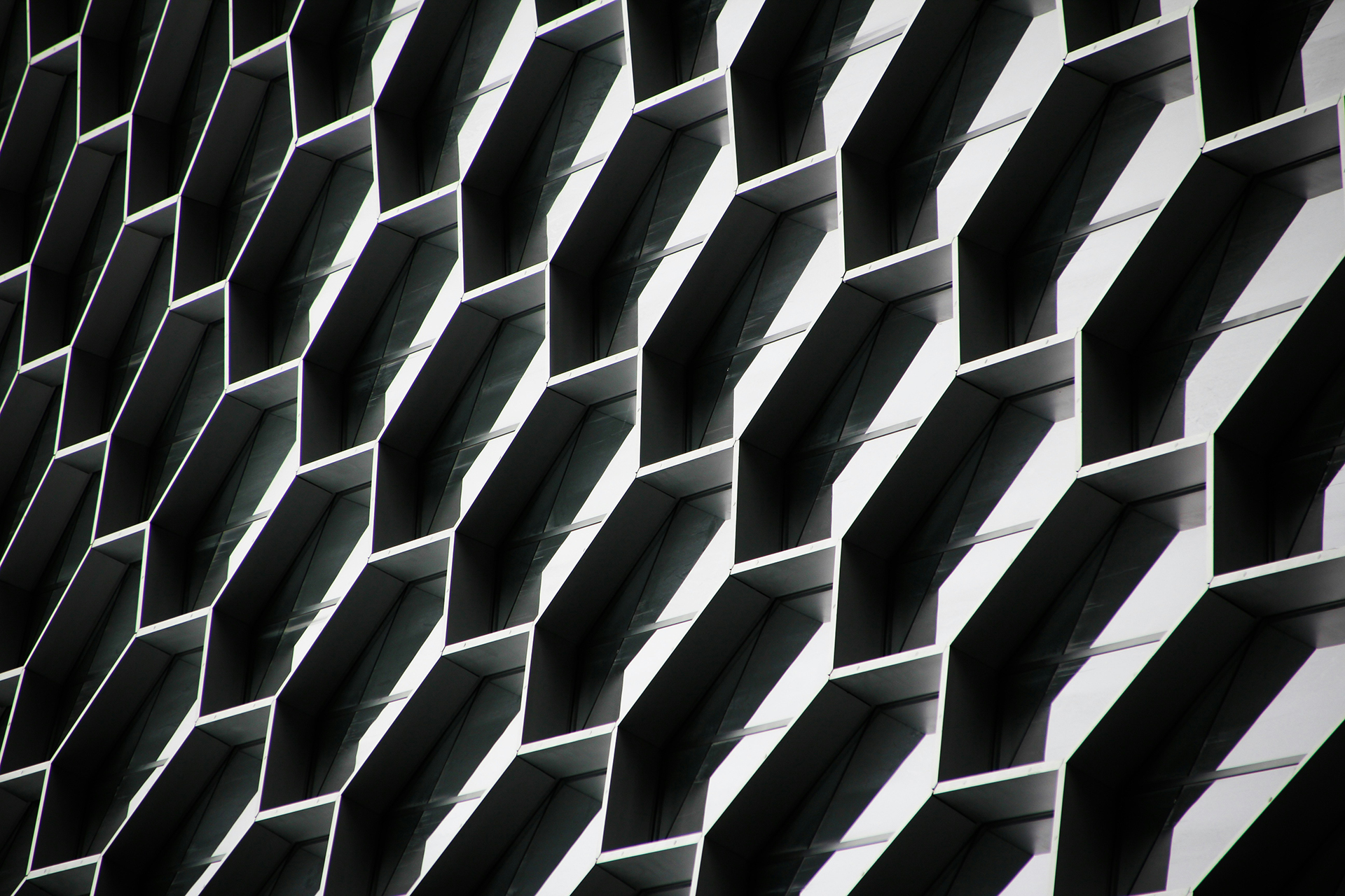Abstract illustration symbolising collaboration between humans and AI – featuring a stylised network of people, gears, and digital interfaces in motion.